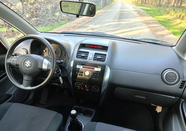 Suzuki SX4 cena 26990 przebieg: 170000, rok produkcji 2009 z Stepnica małe 379